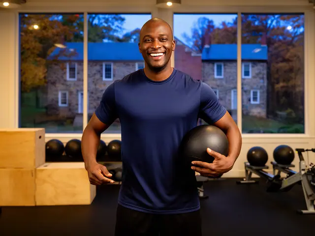 A fitness-studio owner holding a medicine ball.